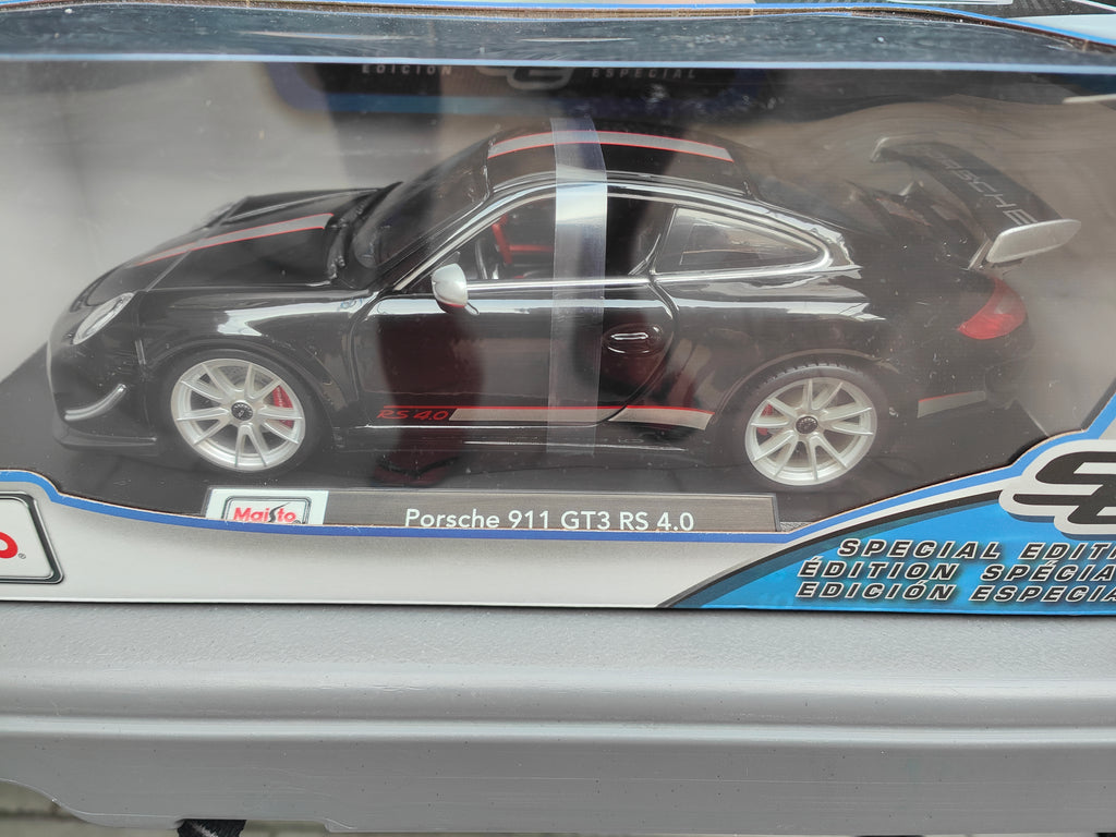 Porsche 911 GT3 RS 4.0 en color negro escala 1:18